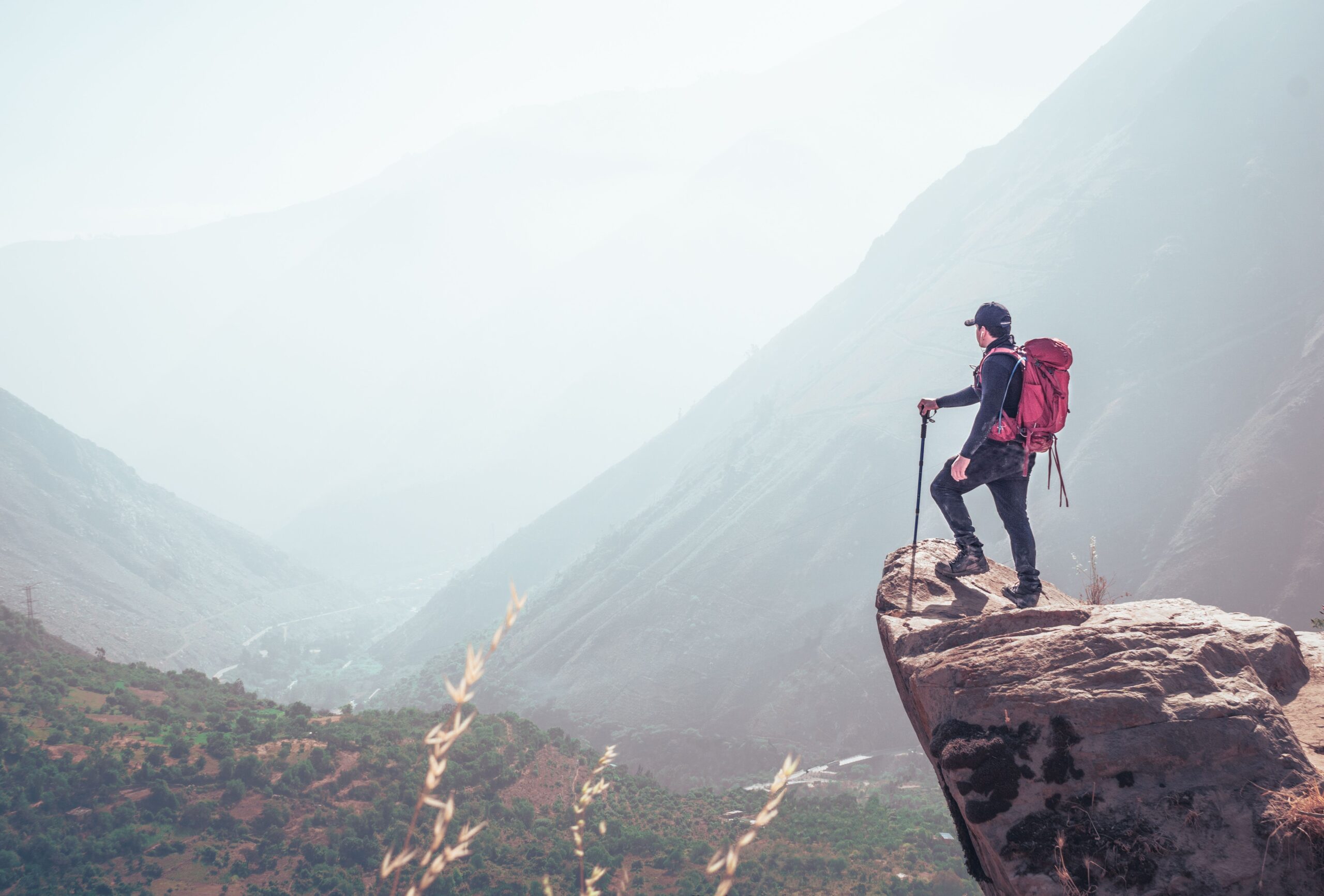 person climbing mountain